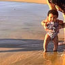 toddler, child, beach, water, sand, sunlight, swimsuit, adult, shadow, summer, outdoor, smile, holding, person, nature, vacation, play, happy, sunshine, waves