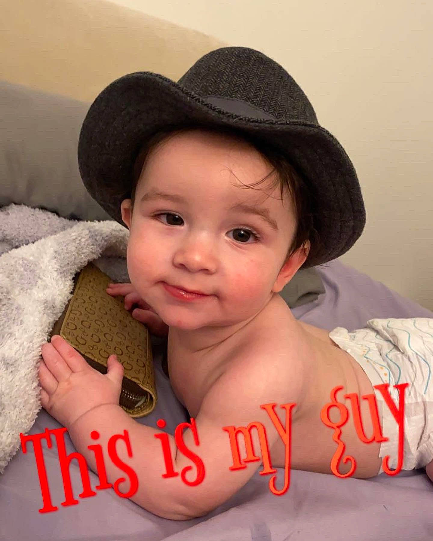 Khai is registered to the contest to win money with this photo: baby, black_hair, chin, comfort, cool, elbow, eye, eyebrow, finger, flash_photography, gesture, hand, happy, hat, lip, mouth, person, skin, sleeve, smile