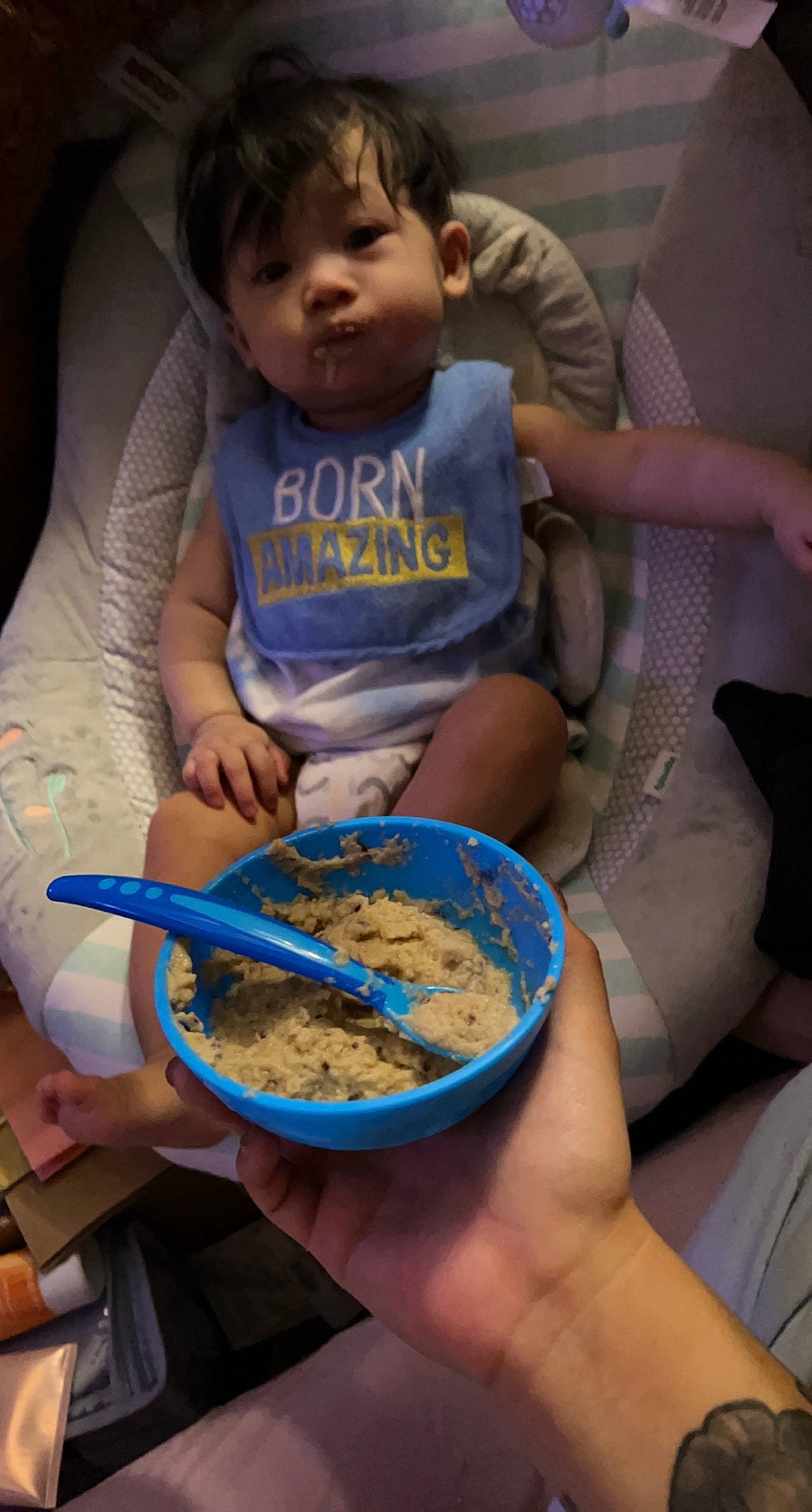 Chozen is registered to the contest to win money with this photo: baby, bowl, chair, child, comfort_food, cooking, cuisine, dish, eating, finger, food, hand, ingredient, meal, mixture, person, recipe, spoon, staple_food, tableware