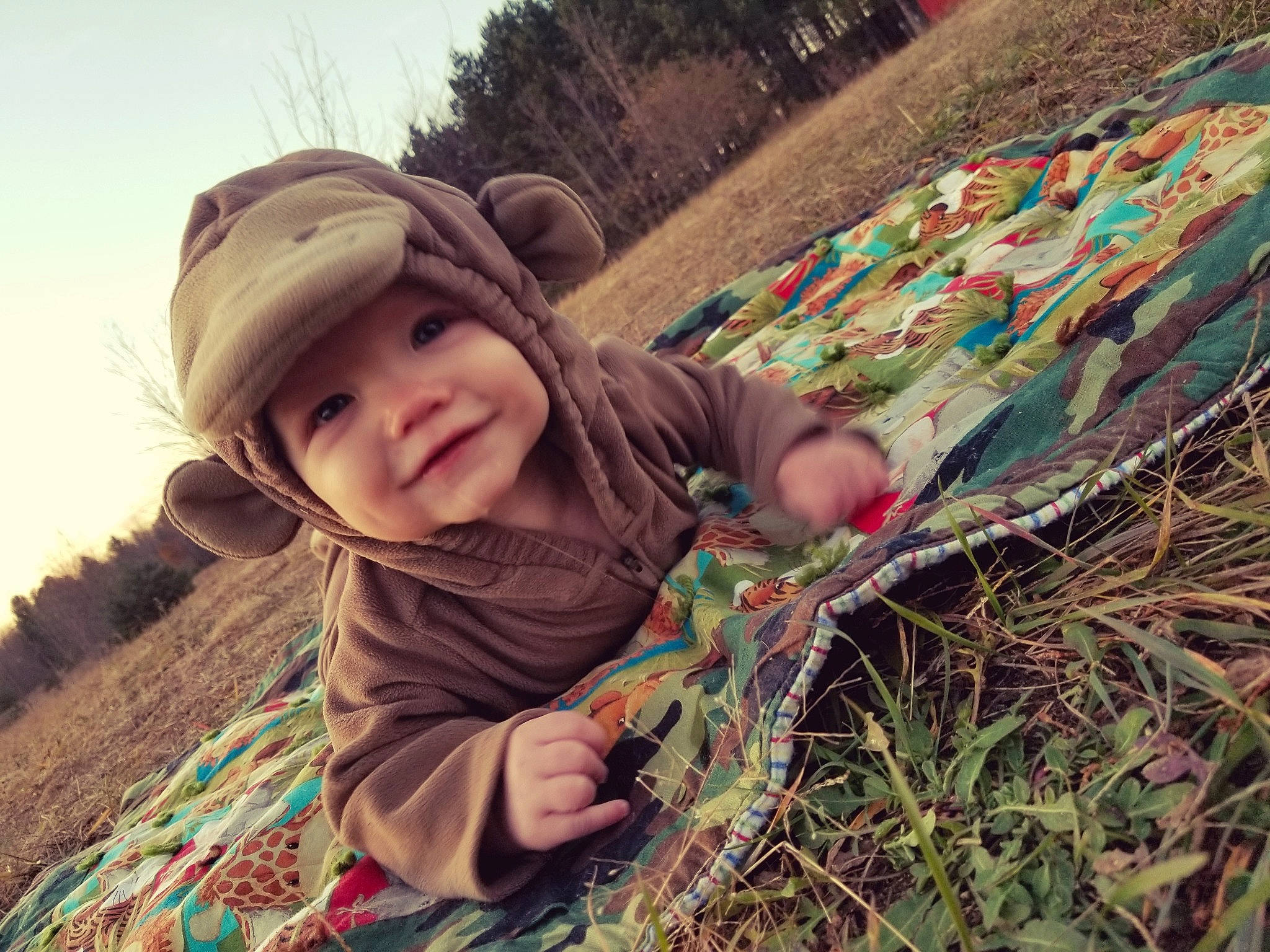 Ryan is registered to the contest to win money with this photo: child, fun, girl, grass, grass_family, headgear, headwear, joy, person, plant, soil, toddler, tree