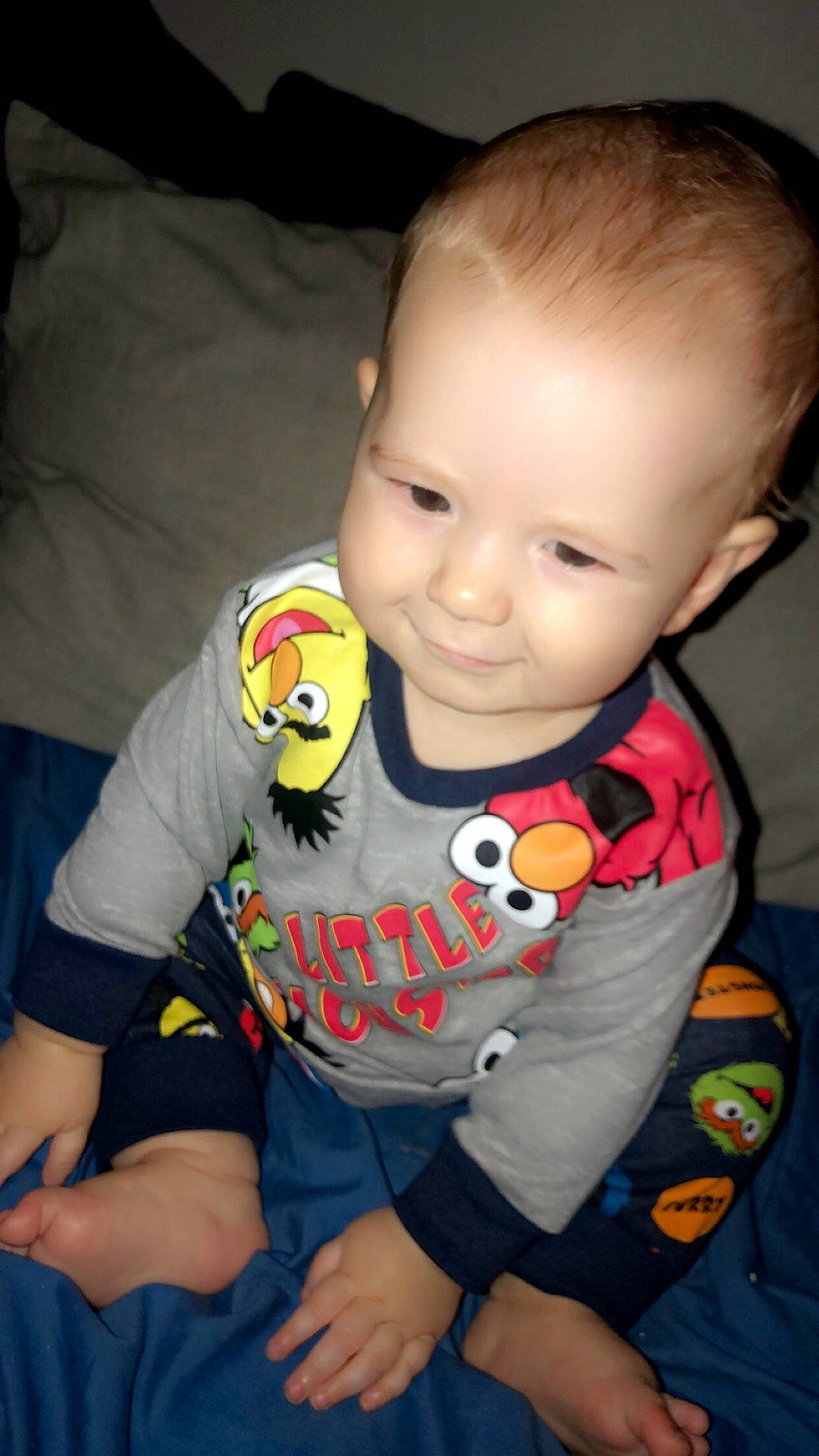 Alec is registered to the contest to win money with this photo: arm, baby_toddler_clothing, cheek, chin, eye, facial_expression, human_body, iris, joint, joy, leg, mammal, mouth, nose, orange, person, skin, sleeve, smile, standing