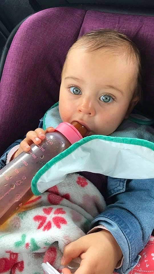 Eden participe au concours pour gagner de l'argent avec cette photo : baby, baby_toddler_clothing, beauty, cheek, child, comfort, drinkware, eye, eyebrow, eyelash, finger, gesture, iris, lip, mouth, nail, nose, person, skin, surprise