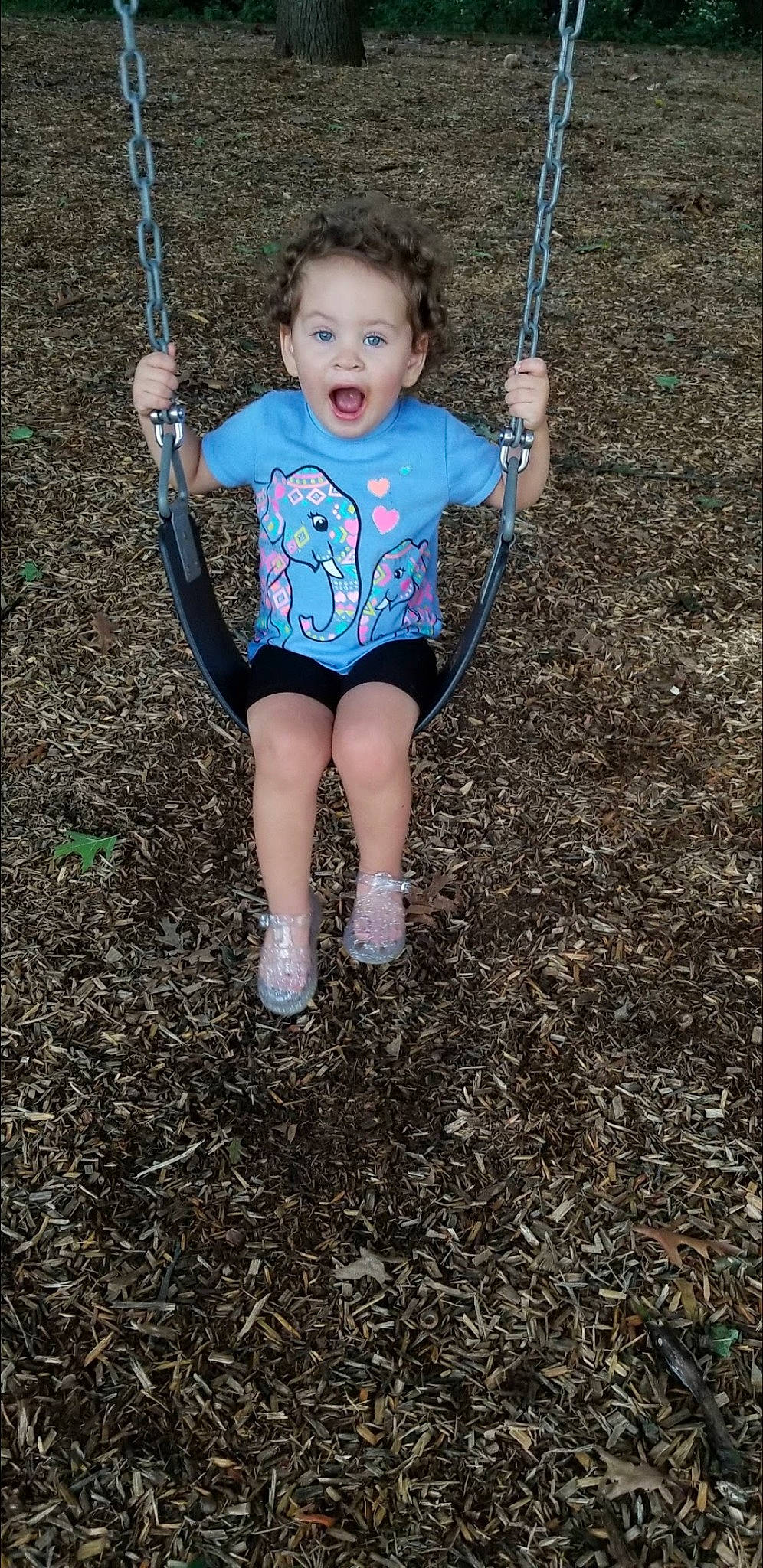 Arianna joined the competition — help win amazing prizes! baby, baby_toddler_clothing, child, city, electric_blue, finger, fun, grass, happy, outdoor_play_equipment, people_in_nature, person, play, playground, recreation, sleeve, smile, soil, surprise, swing