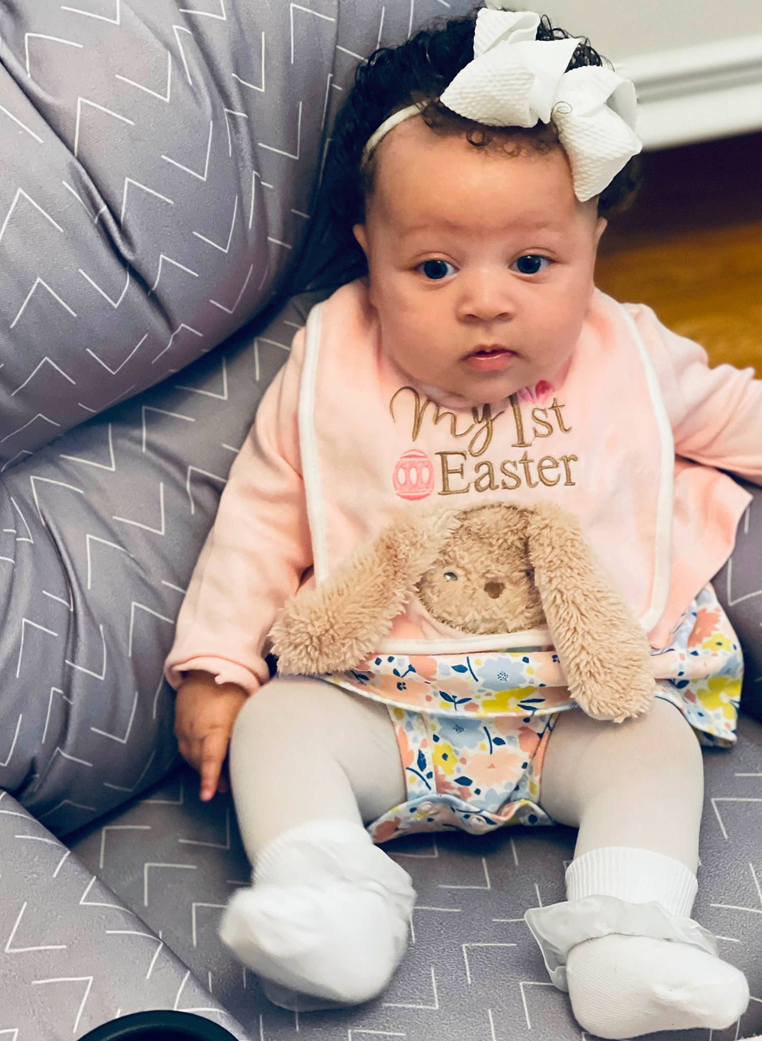 Leighton joined the competition — help win amazing prizes! baby, baby_toddler_clothing, cap, cheek, comfort, eye, facial_expression, fun, hairstyle, happy, pattern, person, pink, sitting, skin, sleeve, sock, standing, textile, toddler