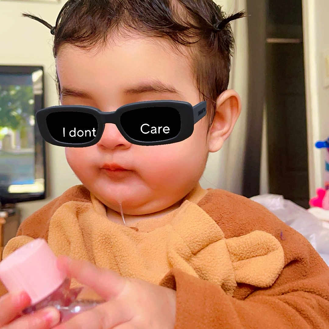 Arzoi is registered to the contest to win money with this photo: accessories, baby, bodypart, bottle, cosmetics, face, finger, glasses, goggles, hand, happy, head, lotion, person, photoframe, photography, portrait, smile, spitting, sunglasses