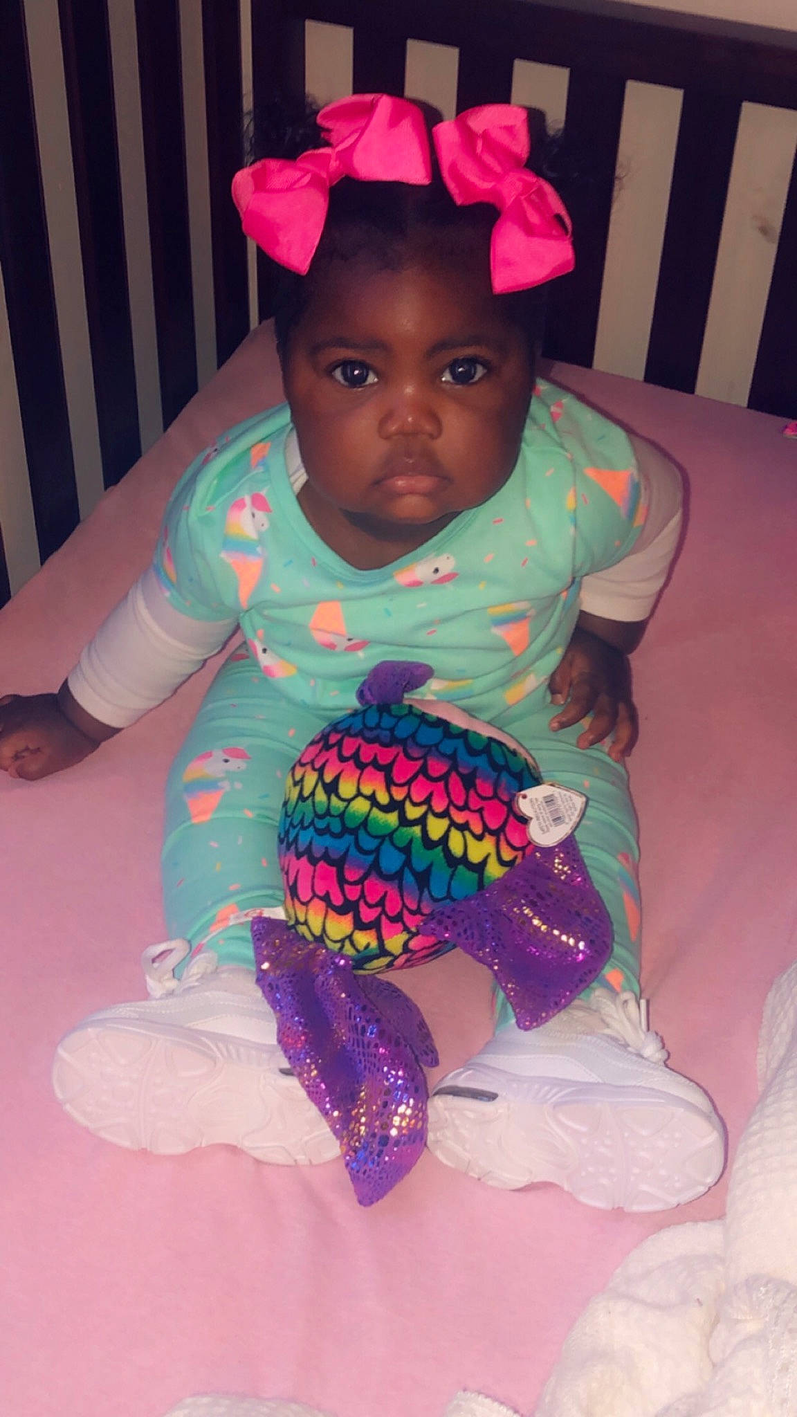 Egypt is registered to the contest to win money with this photo: baby_toddler_clothing, child, hair_accessory, person, pink, play, purple, toddler