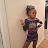 Avah joined the competition — help win amazing prizes! child, girl, cheerleader, pose, peace_sign, cheer_challenge, sparkly_outfit, black_shoes, curly_hair, hair_bow, indoor, wooden_floor, wall, confident, attitude, pout, young, standing, fashion, portrait