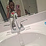 Avah joined the competition — help win amazing prizes! child, girl, mirror, selfie, bathroom, sink, faucet, peace_sign, bow, phone, reflection, door, teddy_bear, bracelet, floral_dress, wall, light_switch, cabinet, mirror_selfie, young