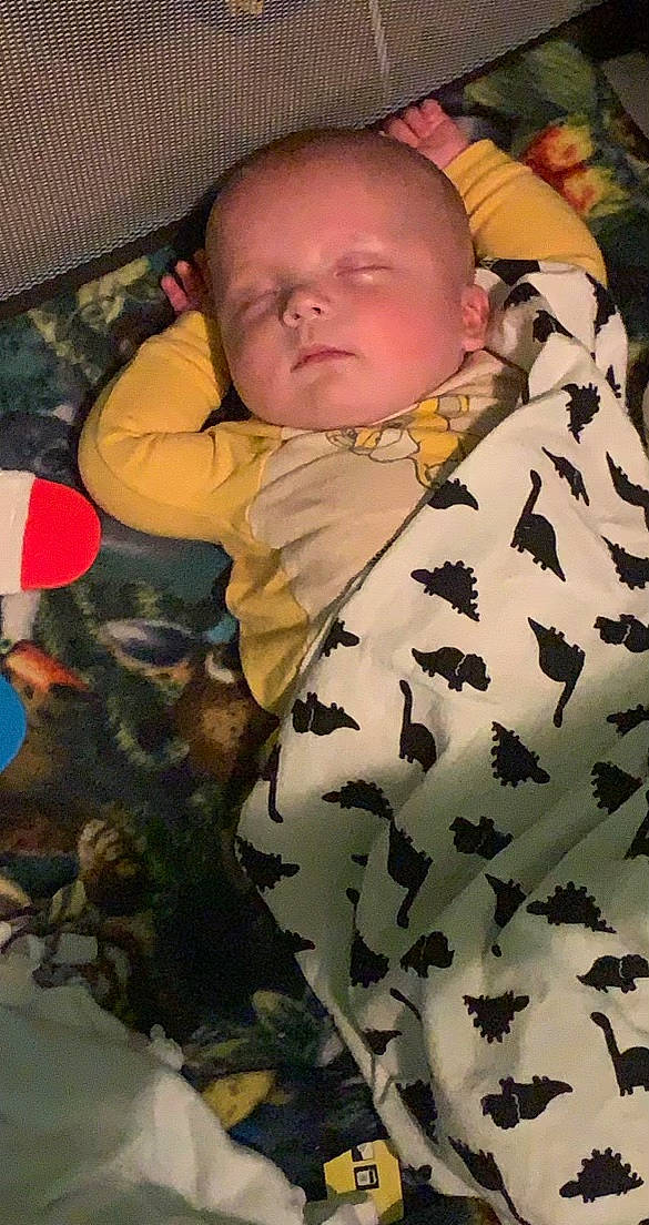 Carsyn is registered to the contest to win money with this photo: baby, baby_products, baby_toddler_clothing, camouflage, child, collar, comfort, fur, linens, mammal, military_camouflage, pattern, person, skin, sleeve, toddler, uniform, vertebrate