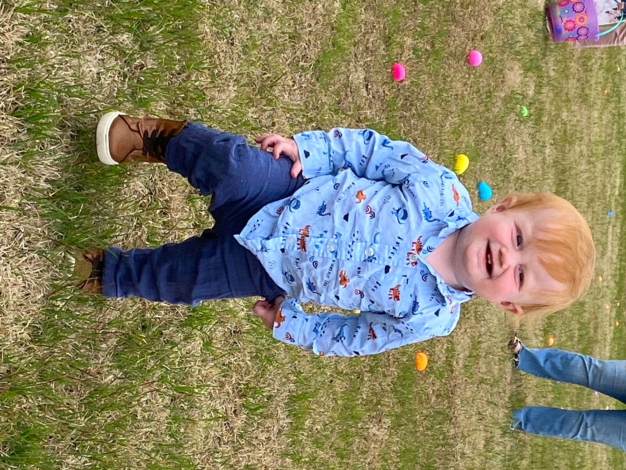 Aiden is registered to the contest to win money with this photo: baby_toddler_clothing, child, electric_blue, fun, grass, grass_family, grassland, happy, joy, lawn, leisure, meadow, pattern, people_in_nature, person, plant, play, recreation, sitting, smile