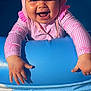baby, blue, child, cute, face, hands, happy, infant, inflatable_pool, joyful, outdoor, pink_hat, playful, portrait, smiling, striped_clothing, summer, sun_protection, sunlight, water