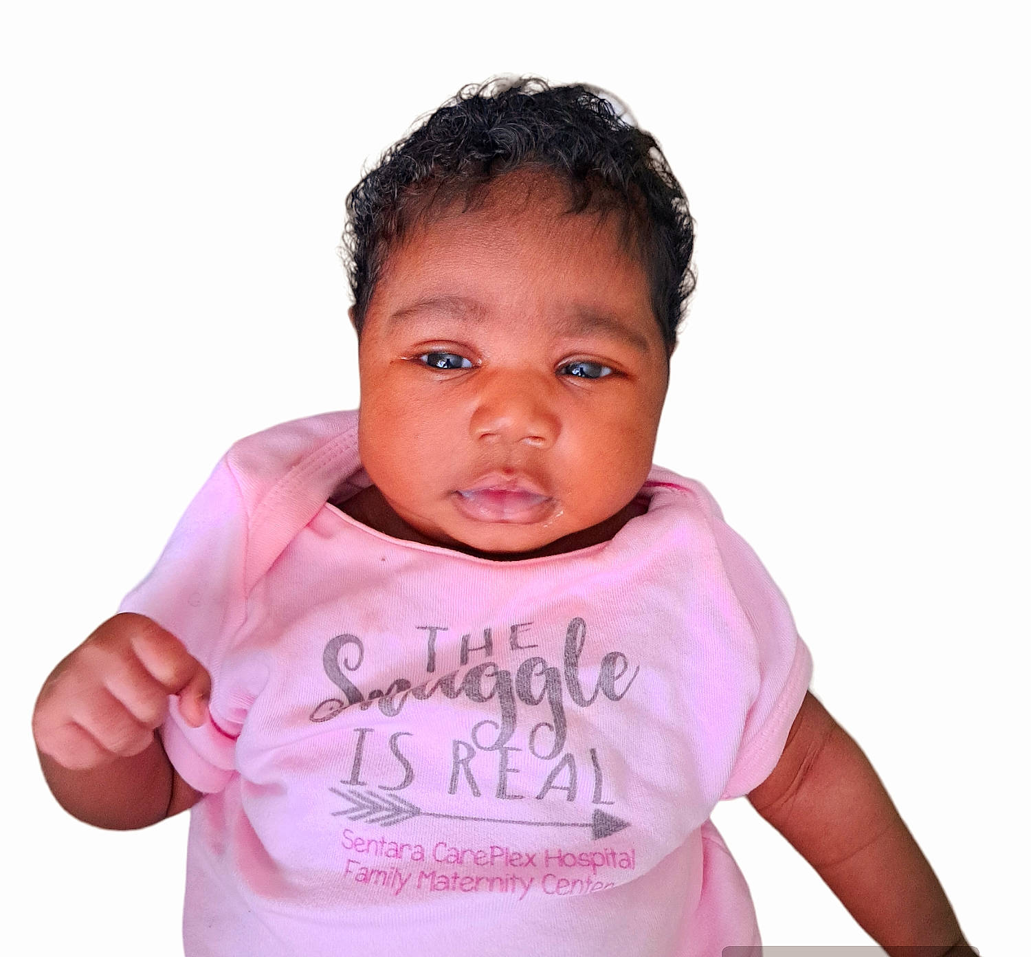 Journee is registered to the contest to win money with this photo: baby, baby_toddler_clothing, cheek, eye, eyebrow, eyelash, face, finger, gesture, hair, hand, happy, human_body, iris, nose, person, pink, sleeve, smile, t_shirt