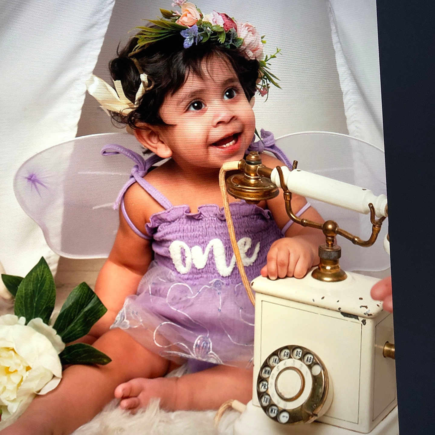 Mehwish is registered to the contest to win money with this photo: baby, bodypart, clothing, dialtelephone, dress, electronics, face, finger, flower, flowerarrangement, flowerbouquet, head, person, petal, phone, photography, plant, portrait, pottedplant, rose