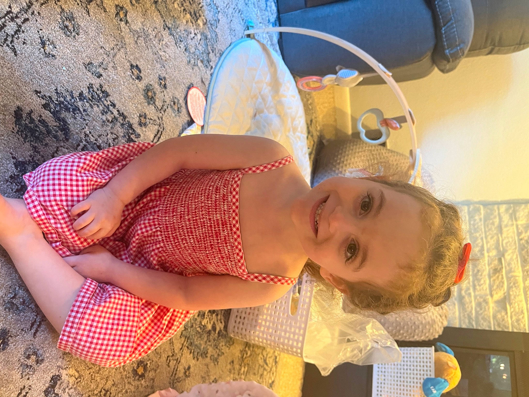 Avalyn is registered to the contest to win money with this photo: abdomen, baby, beach, child, eyewear, fun, happy, hat, human_leg, joy, landscape, leg, leisure, pattern, person, skin, smile, thigh, toddler, trunk