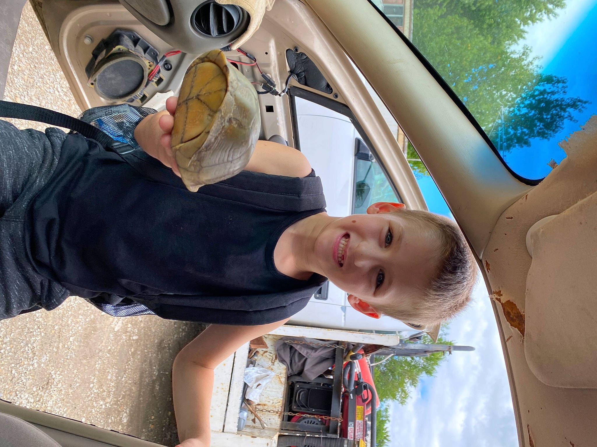 Weston joined the competition — help win amazing prizes! auto_part, automotive_design, automotive_exterior, automotive_lighting, car, eyewear, fun, hood, joy, leisure, light, motor_vehicle, person, photograph, snapshot, steering_wheel, tree, vehicle, vehicle_door, wheel