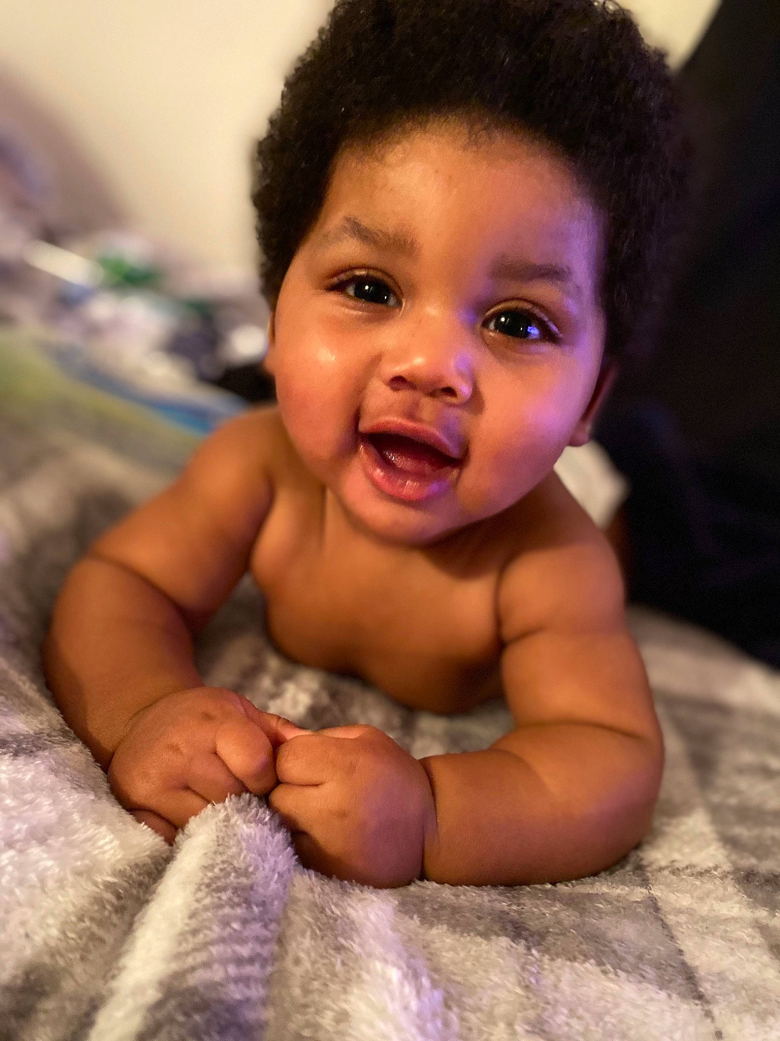 Keanu is registered to the contest to win money with this photo: baby, black_hair, cheek, chest, ear, eyebrow, eyelash, finger, forehead, gesture, hair, happy, human_body, iris, lip, mouth, nose, person, skin, smile