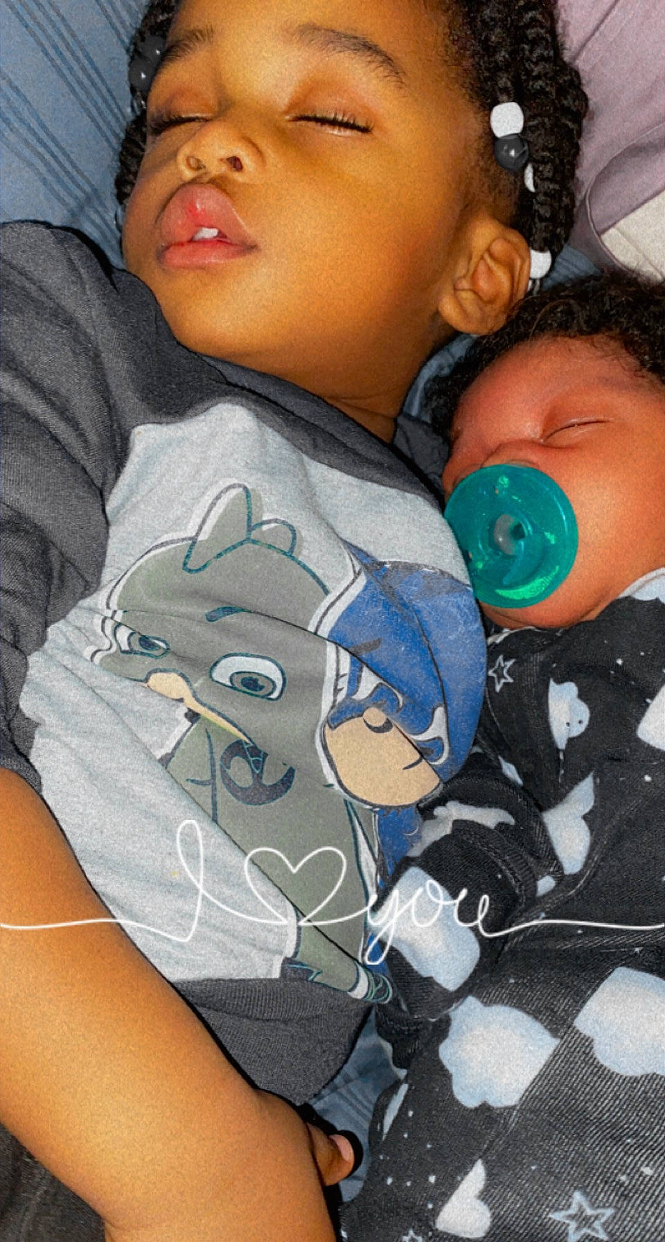 Keanu is registered to the contest to win money with this photo: black, cheek, comfort, face, gesture, hairstyle, happy, head, human, joint, mouth, muscle, neck, nose, organ, person, product, skin, sleeve, textile