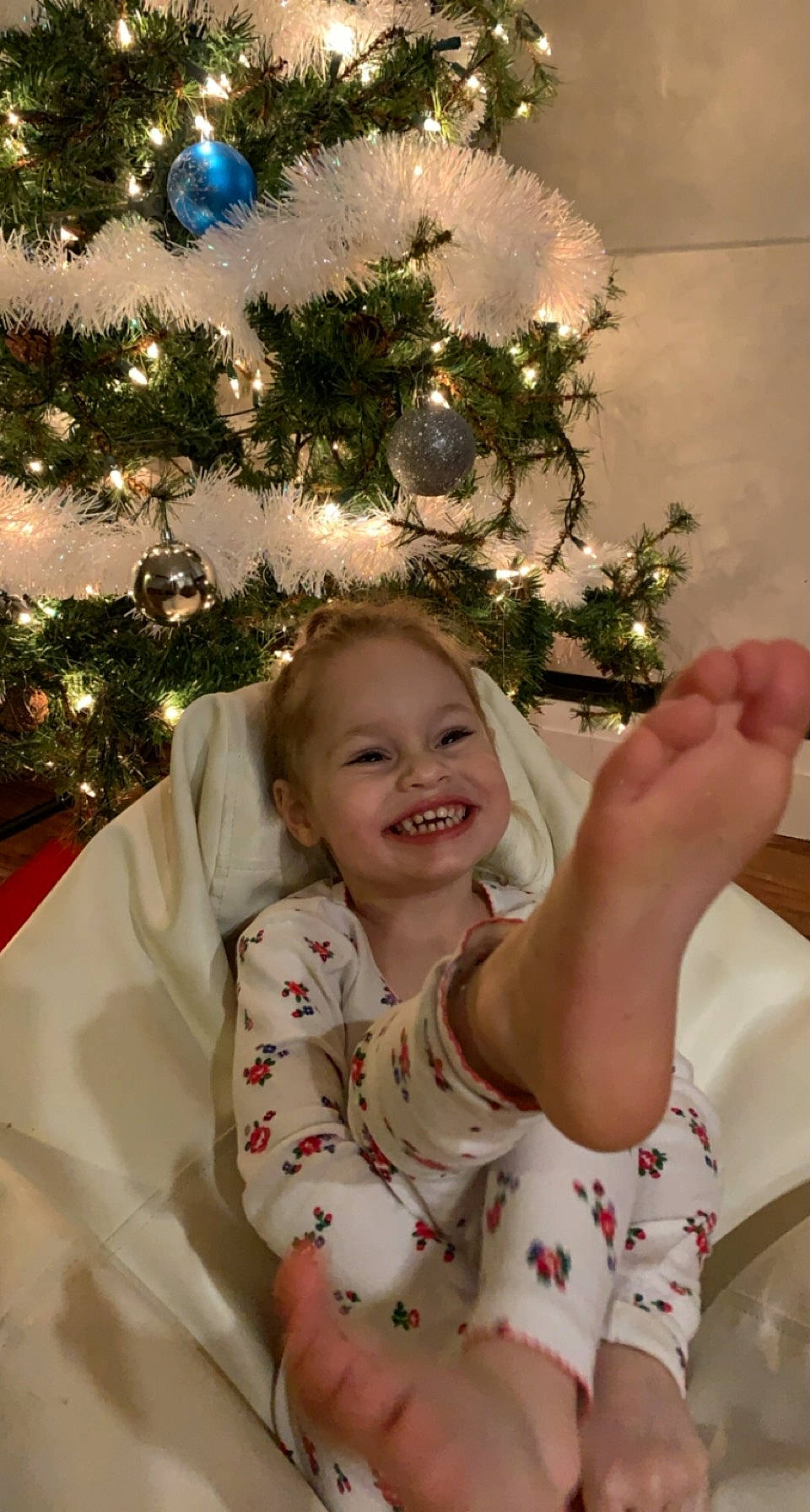 Tessa joined the competition — help win amazing prizes! baby_toddler_clothing, child, christmas, christmas_decoration, christmas_eve, christmas_lights, christmas_ornament, christmas_tree, facial_expression, happy, holiday, holiday_ornament, interior_design, joy, laugh, ornament, person, pine_family, sleeve, smile