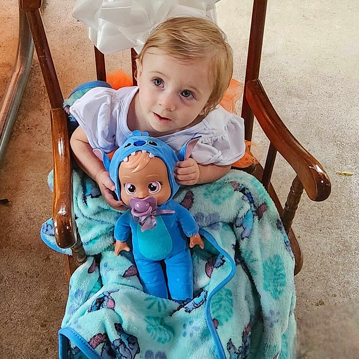 Oceana joined the competition — help win amazing prizes! baby, blanket, chair, chaise, clothing, face, furniture, head, infantbed, person, photography, portrait, racket, rockingchair, sitting, sleeve, sport, tennis, tennisracket, toy