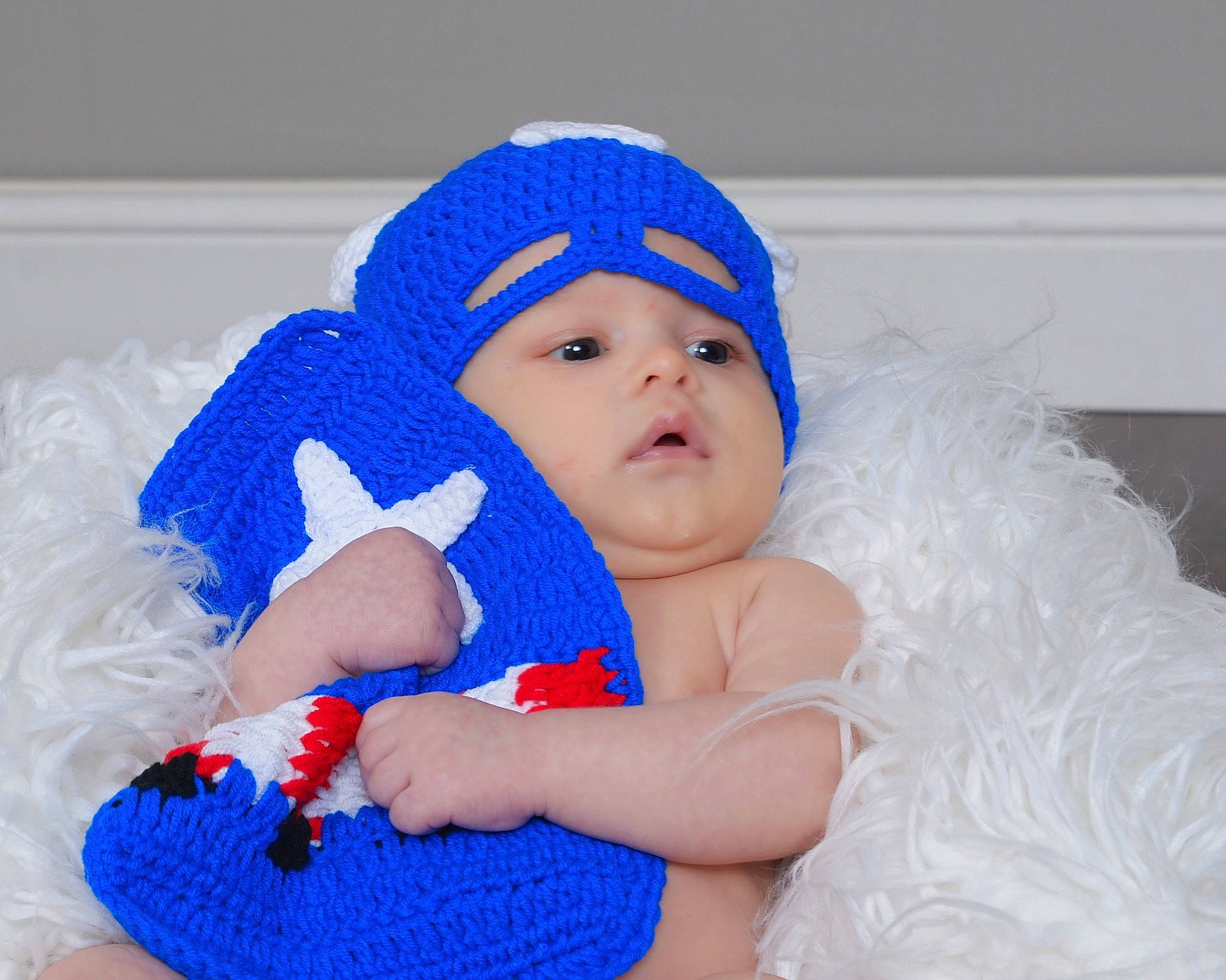 Matteo joined the competition — help win amazing prizes! baby, baby_sleeping, baby_toddler_clothing, cap, child, clothing, comfort, electric_blue, face, facial_expression, head, headgear, headwear, iris, knit_cap, outerwear, person, pink, skin, textile