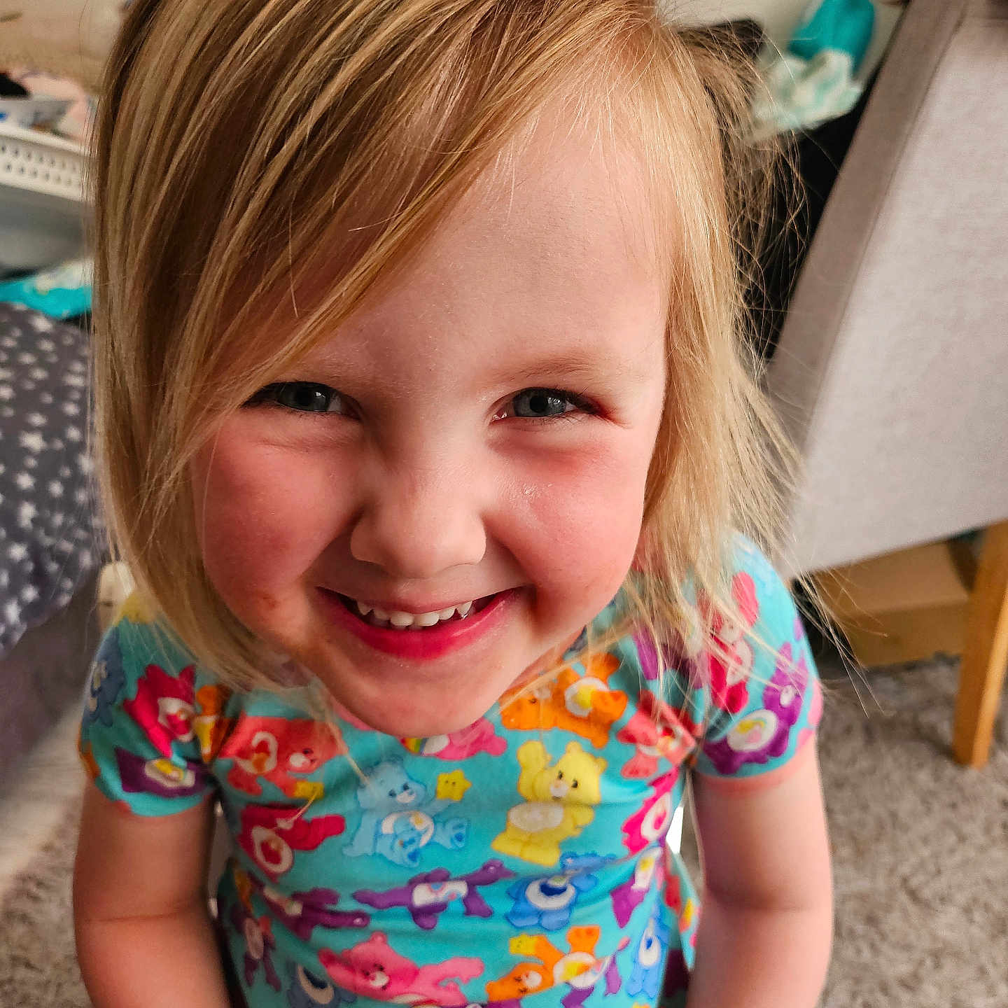 Aurora joined the competition — help win amazing prizes! bear_pattern, blonde_hair, carpet, cartoon, cheerful, child, closeup, colorful, cute, dress, furniture, happy, indoor, kid, person, playful, portrait, sitting, smiling, young