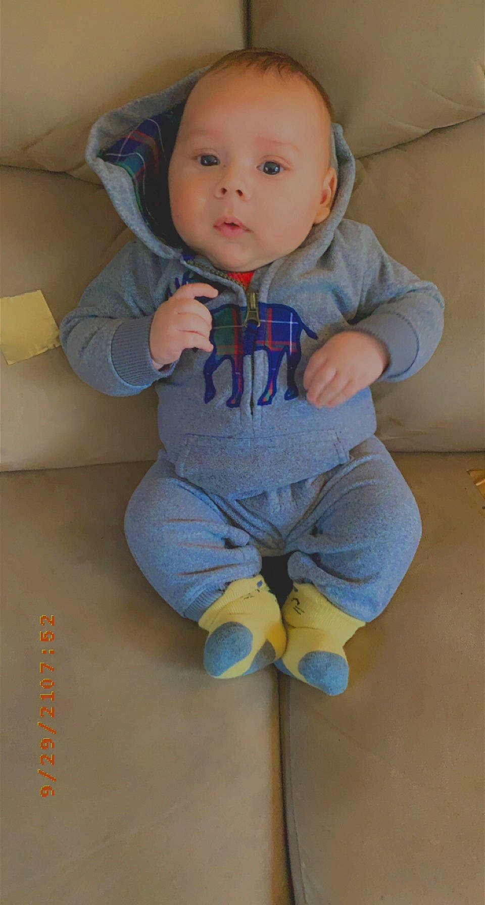 Royson is registered to the contest to win money with this photo: baby, baby_toddler_clothing, cheek, child, chin, comfort, electric_blue, eye, flooring, hair, human_body, iris, leg, linens, nose, person, skin, sleeve, sportswear, t_shirt
