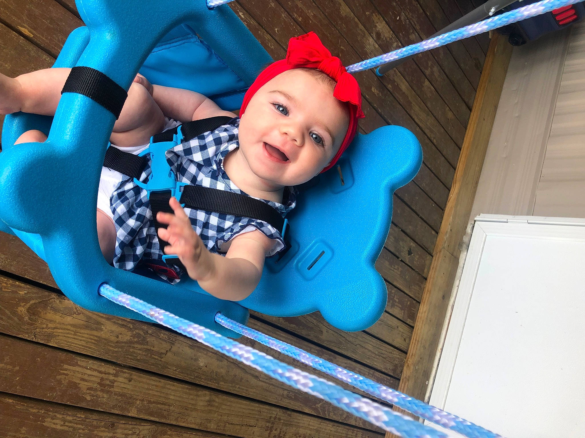 Emberlyn joined the competition — help win amazing prizes! azure, baby, baby_products, baby_toddler_clothing, blue, child, city, electric_blue, fun, happy, headwear, leisure, magenta, outdoor_play_equipment, person, play, recreation, sitting, smile, swing