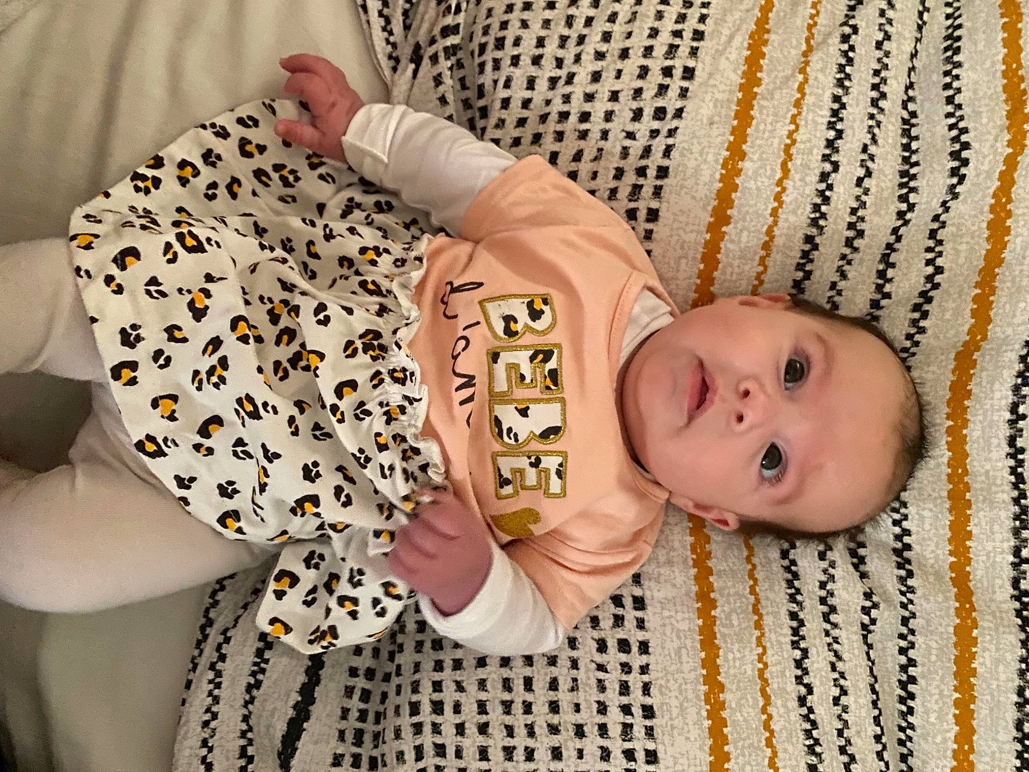 Nahia a rejoint le concours — aidez-le/la à gagner de superbes lots ! arm, baby, baby_products, baby_toddler_clothing, cheek, child, comfort, eye, face, facial_expression, finger, hand, headgear, linens, outerwear, pattern, person, skin, sleeve, toddler