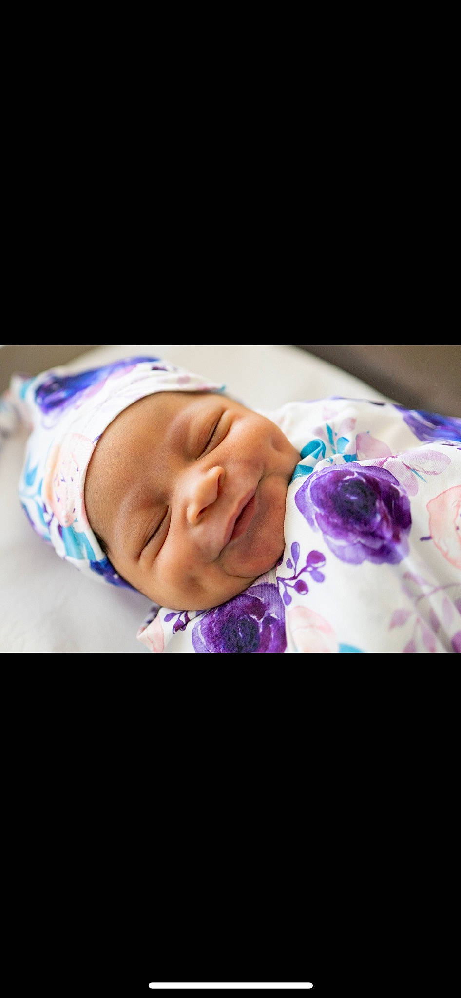 Raelyn joined the competition — help win amazing prizes! baby, baby_laughing, cheek, child, electric_blue, eyelash, fashion_accessory, flash_photography, happy, headwear, iris, laugh, magenta, pattern, person, petal, portrait_photography, purple, sleeve, smile