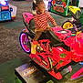 Paityn Williams is registered to the contest to win money with this photo: adult, child, clothing, face, female, footwear, girl, hat, head, indoors, male, man, motorcycle, person, photography, playarea, portrait, shoe, transportation, vehicle