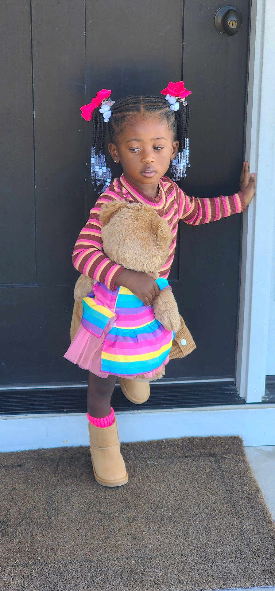 Paityn Williams is registered to the contest to win money with this photo: boot, child, clothing, costume, door, dress, face, female, footwear, girl, hat, head, mat, pants, person, photography, portrait, shoe, skirt, toy