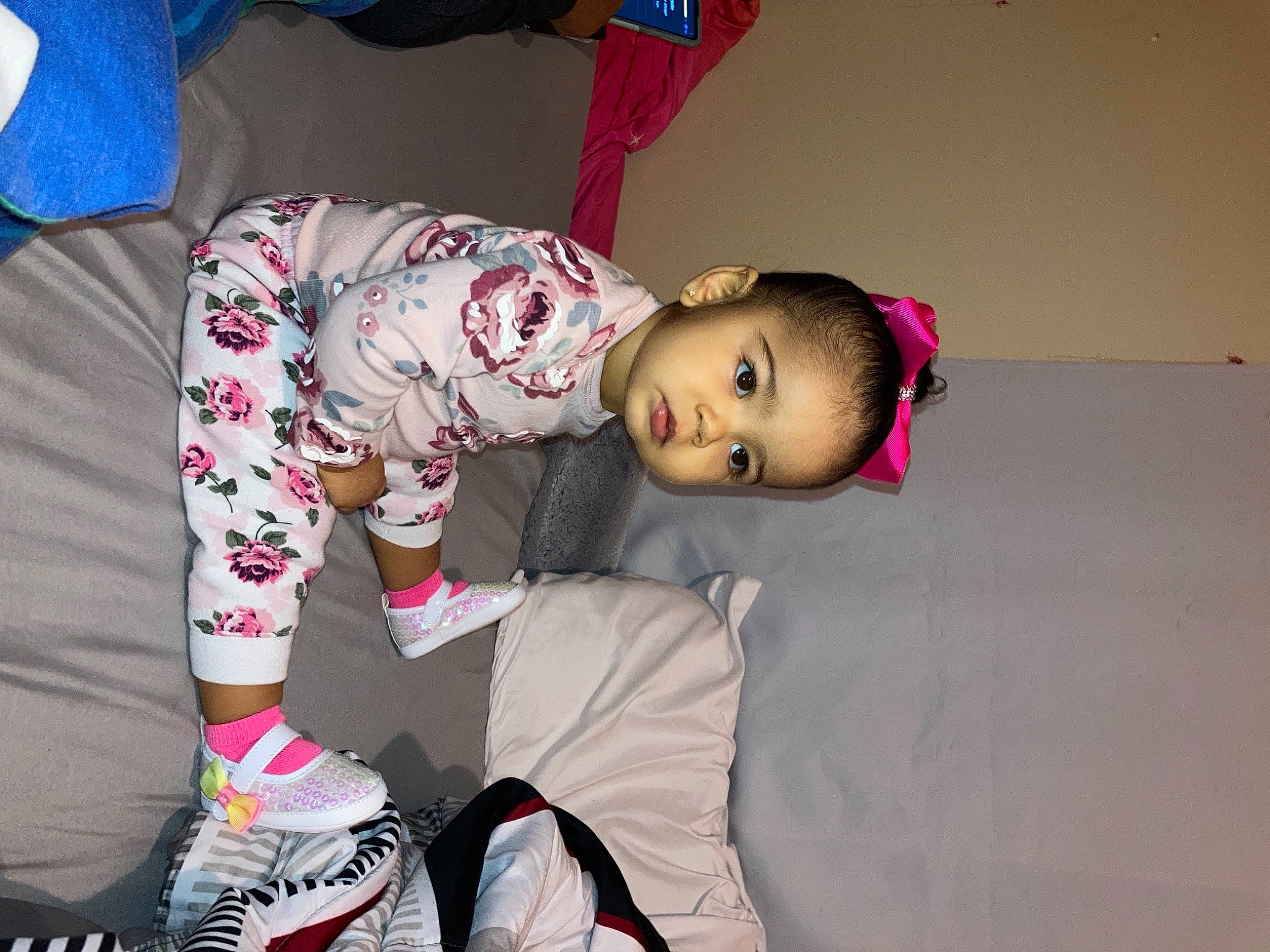 Esmeralda is registered to the contest to win money with this photo: baby, baby_products, baby_toddler_clothing, carmine, child, comfort, costume, event, flooring, fun, happy, linens, magenta, pattern, person, pink, room, sleeve, smile, sock
