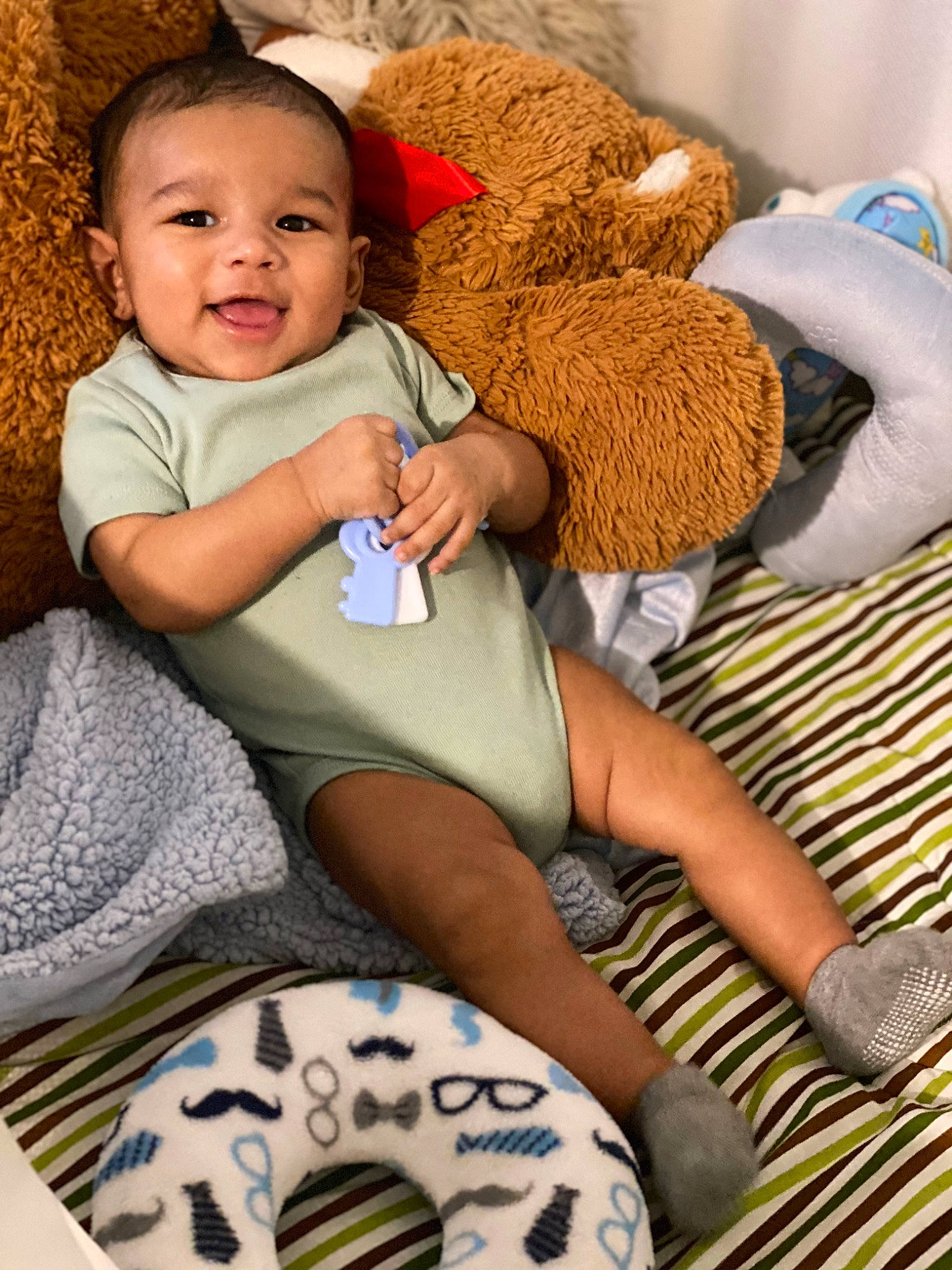 Kenny joined the competition — help win amazing prizes! baby, baby_toddler_clothing, child, comfort, foot, happy, human_body, human_leg, knee, lap, leg, leisure, nail, pattern, person, skin, smile, sock, textile, thigh