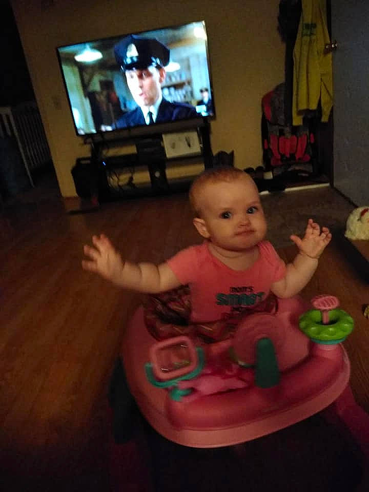 Joslyn is registered to the contest to win money with this photo: baby, child, electronic_device, fun, furniture, party, person, play, sitting, skin, square, table, toddler, vacation