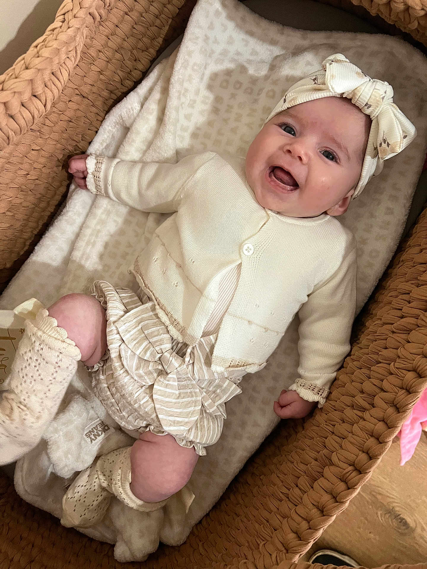 Lylah joined the competition — help win amazing prizes! baby, infant, smiling, headband, bow, knitted_booties, woven_basket, blanket, cozy, clothing, cute, indoor, child, happy, laying_down, soft_texture, portrait, newborn, baby_girl, warm