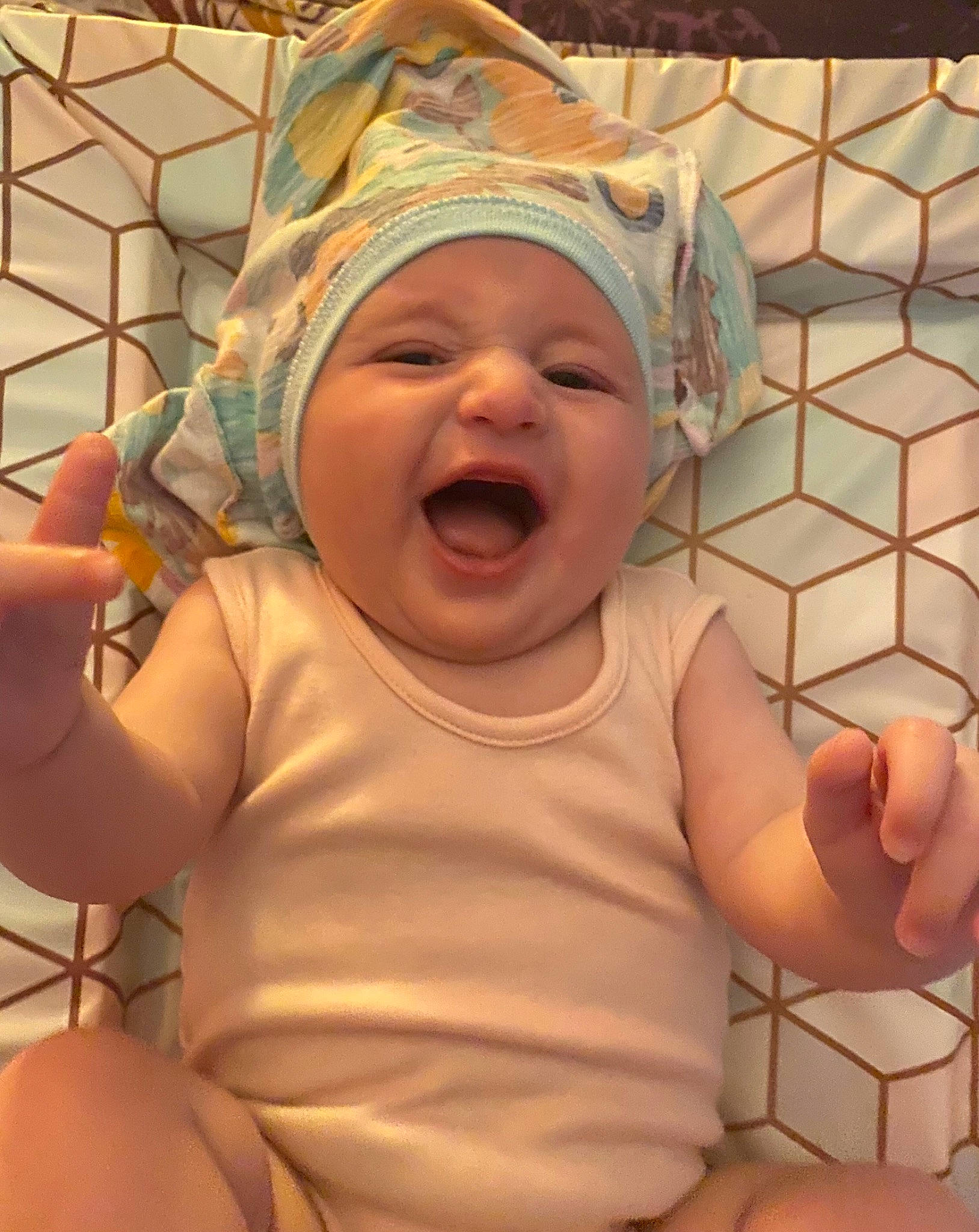 Katie is registered to the contest to win money with this photo: baby, baby_toddler_clothing, cheek, chest, child, chin, comfort, face, fun, gesture, happy, head, headwear, human_body, leisure, mouth, nose, person, skin, smile