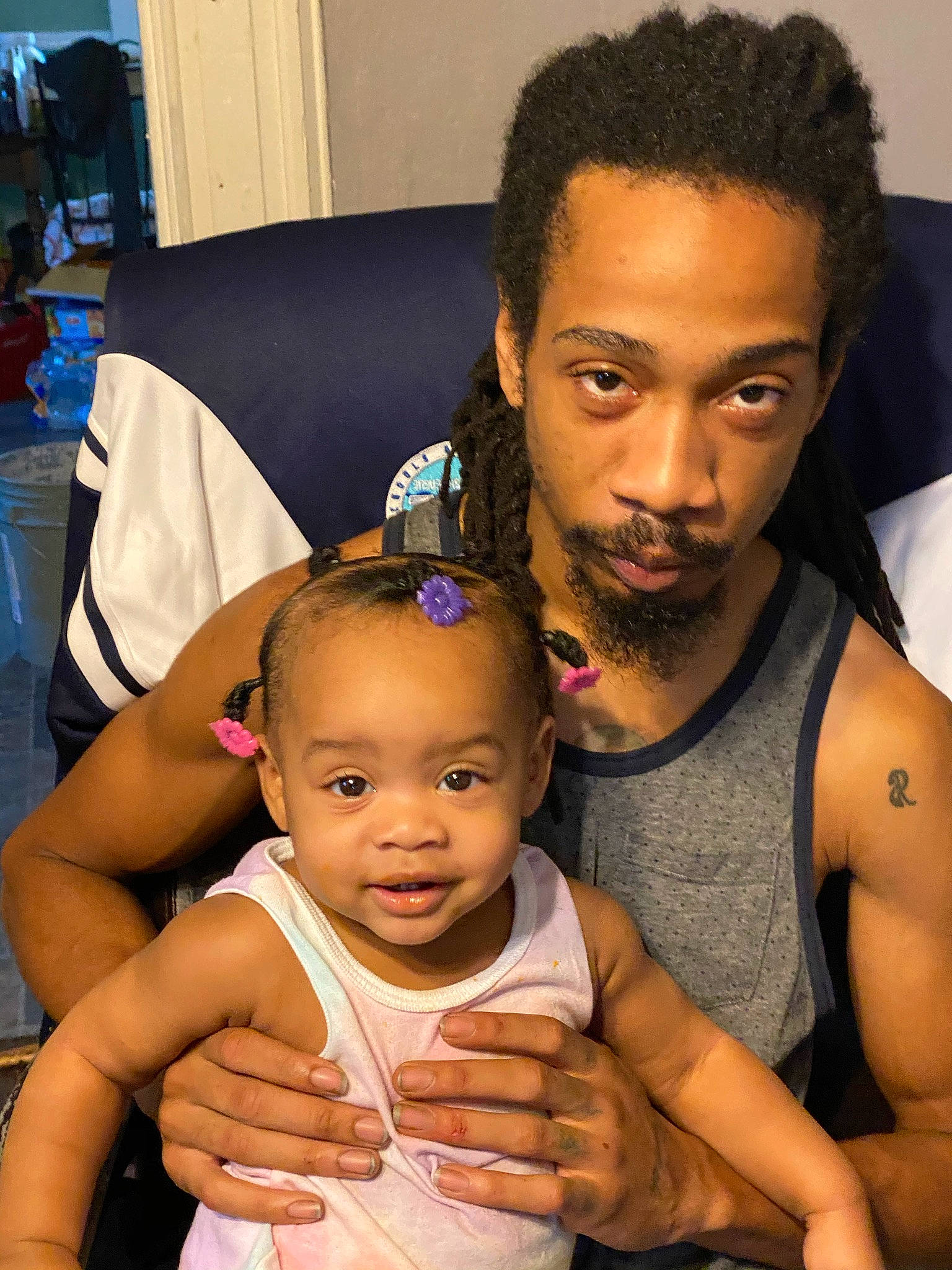 Lacey is registered to the contest to win money with this photo: arm, baby, chest, child, muscle, neck, people, person, thumb, toddler, trunk