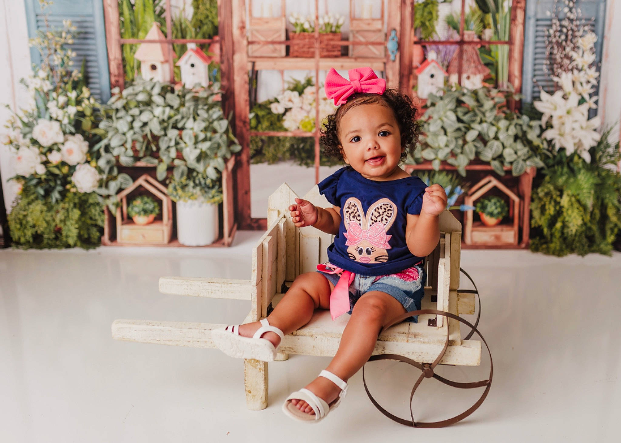 Meliyah joined the competition — help win amazing prizes! baby_toddler_clothing, face, facial_expression, flower, flower_arranging, flowerpot, fun, grass, happy, hat, human_leg, knee, leg, leisure, person, pink, plant, shorts, summer, thigh