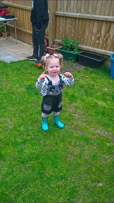 Esmai is registered to the contest to win money with this photo: backyard, ball, child, garden, grass, lawn, person, plant, play, toddler, yard