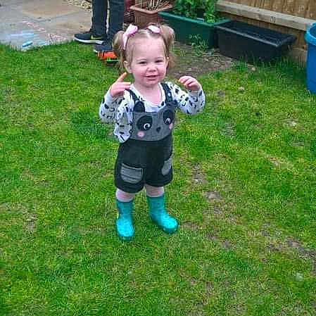 Esmai is registered to the contest to win money with this photo: backyard, ball, child, garden, grass, lawn, person, plant, play, toddler, yard