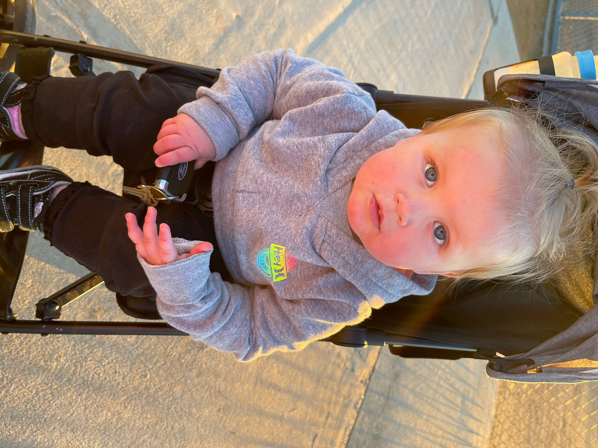 Lailiana joined the competition — help win amazing prizes! auto_part, baby, camera, child, fun, grass, hat, landscape, nail, person, photographer, recreation, sitting, skin, thumb, toddler, tree, wood