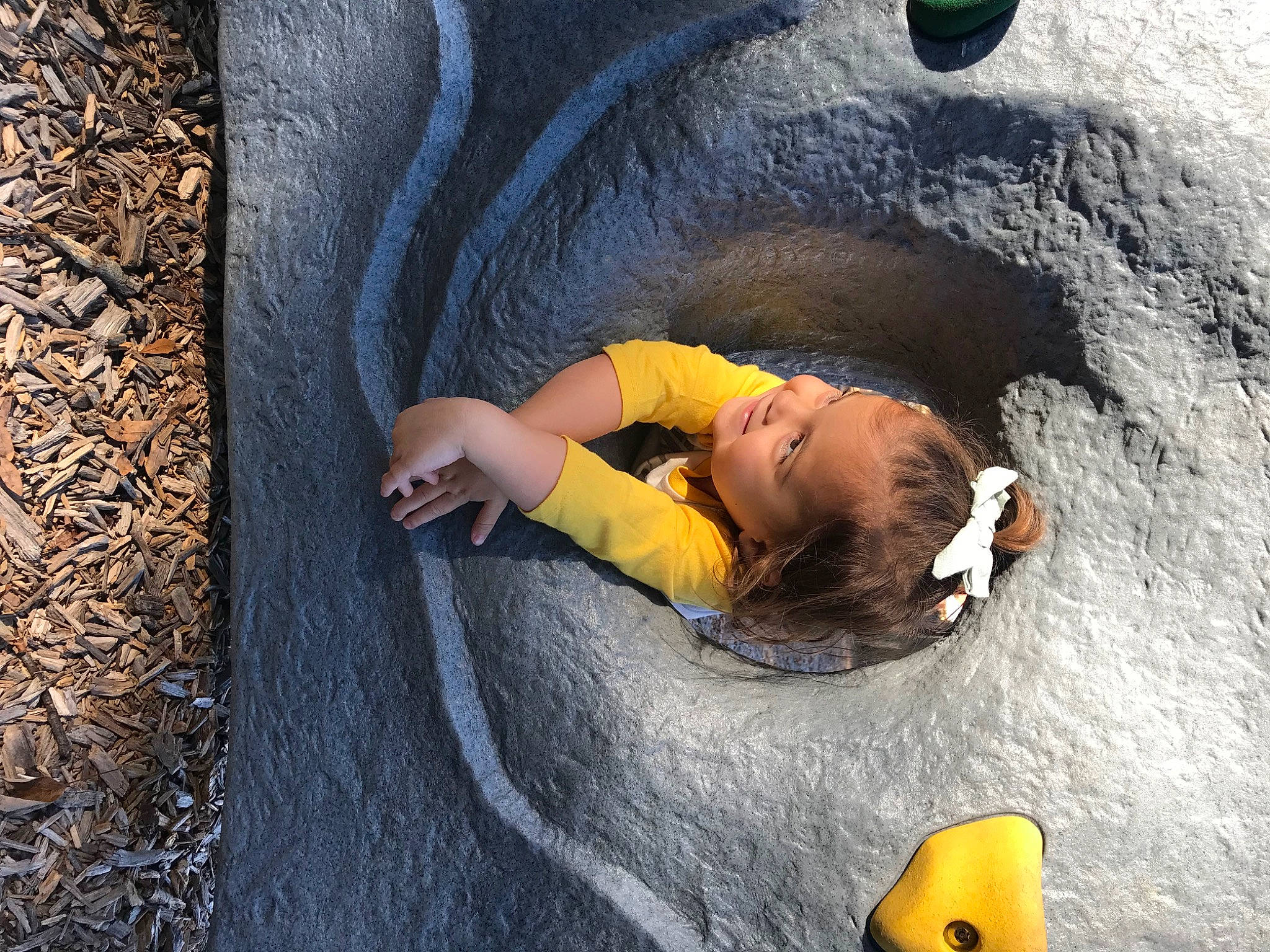 Hattie is registered to the contest to win money with this photo: adventure, asphalt, child, comfort, concrete, fun, grass, joy, landscape, leisure, people_in_nature, person, photograph, recreation, road_surface, rock, snapshot, soil, toddler, toy