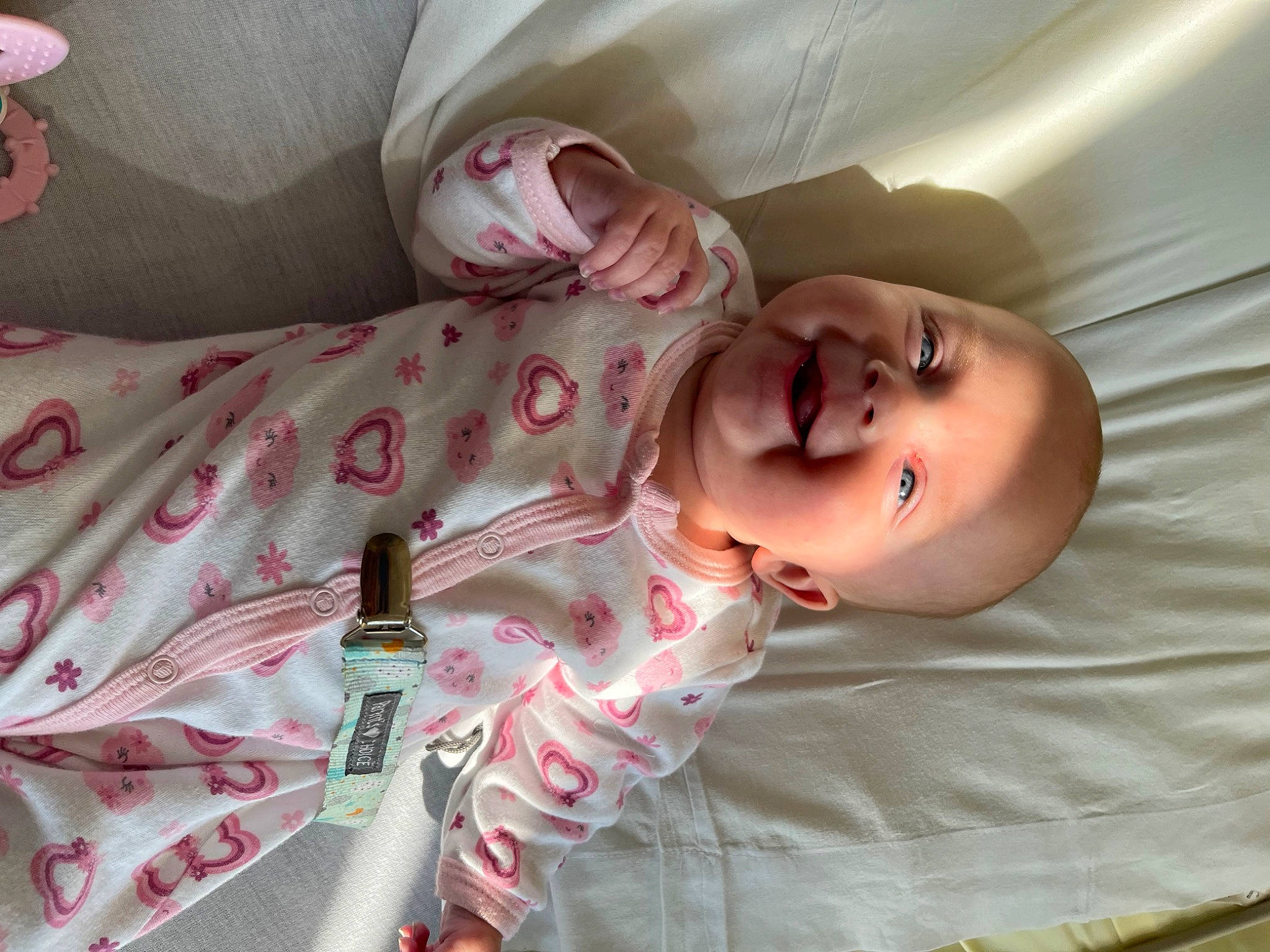 Kaylynn joined the competition — help win amazing prizes! baby, baby_products, bed, bedding, child, comfort, facial_expression, finger, hand, head, human_body, linens, lip, mouth, nose, person, pink, product, room, skin