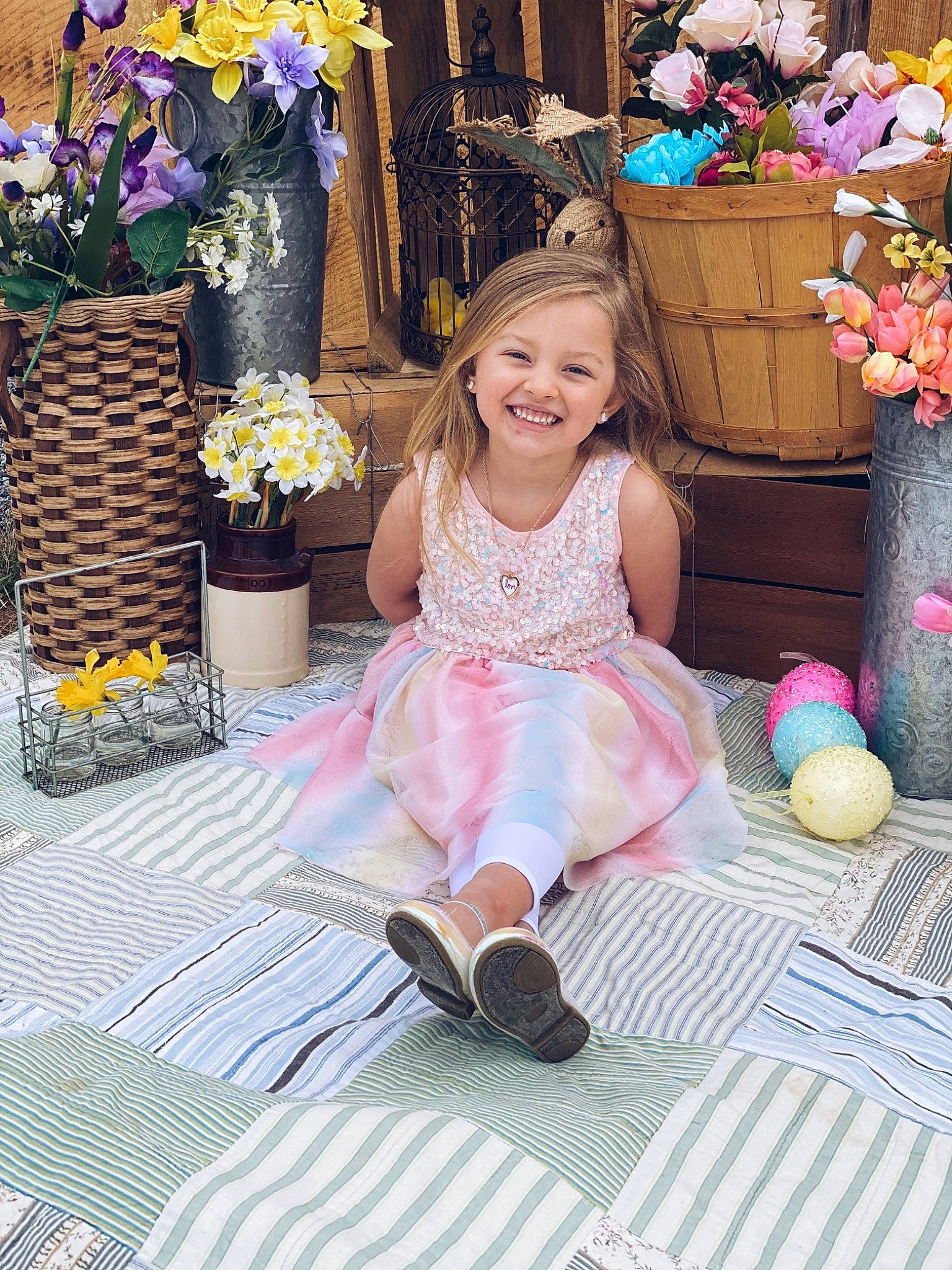 Kameryn joined the competition — help win amazing prizes! baby_toddler_clothing, blue, child, dress, event, flower, flower_arranging, fun, happy, joy, leisure, pattern, person, pink, plant, purple, sitting, smile, summer, textile