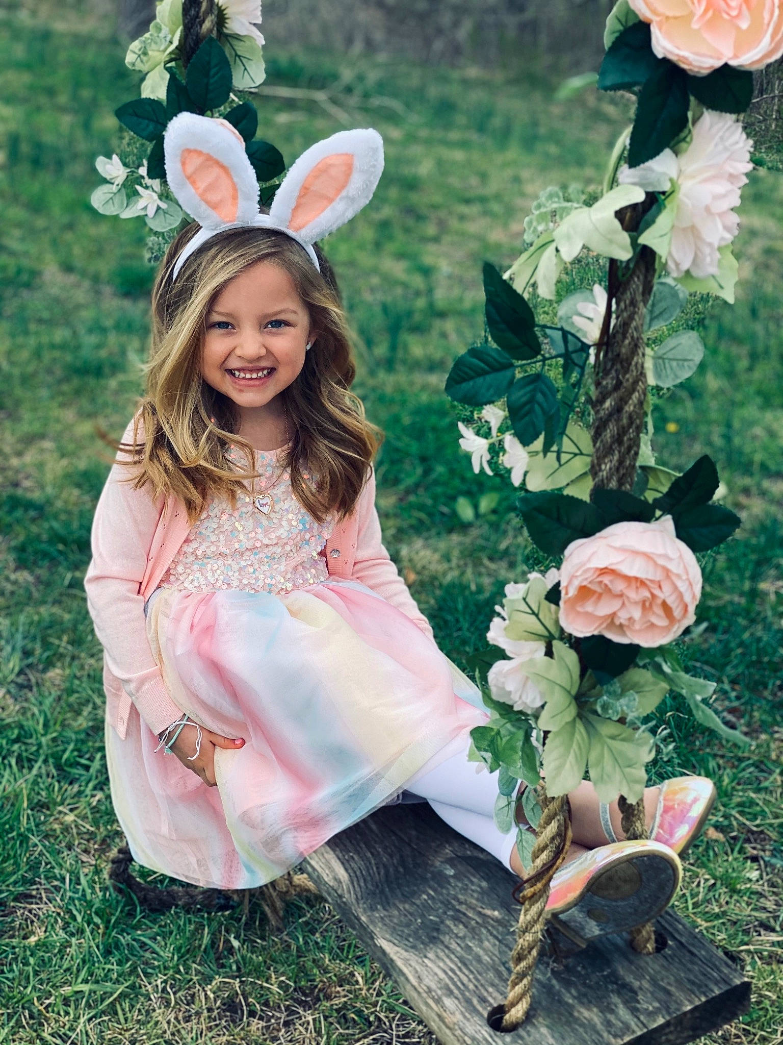 Kameryn joined the competition — help win amazing prizes! botany, clothing, dress, face, fashion, fawn, flower, grass, green, happy, headgear, joy, leaf, people_in_nature, person, petal, photograph, pink, plant, shoe