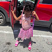 Najiba-Ewele Wright joined the competition — help win amazing prizes! alloywheel, car, carwheel, child, clothing, face, female, footwear, girl, head, machine, person, photography, portrait, skirt, spoke, tire, transportation, vehicle, wheel