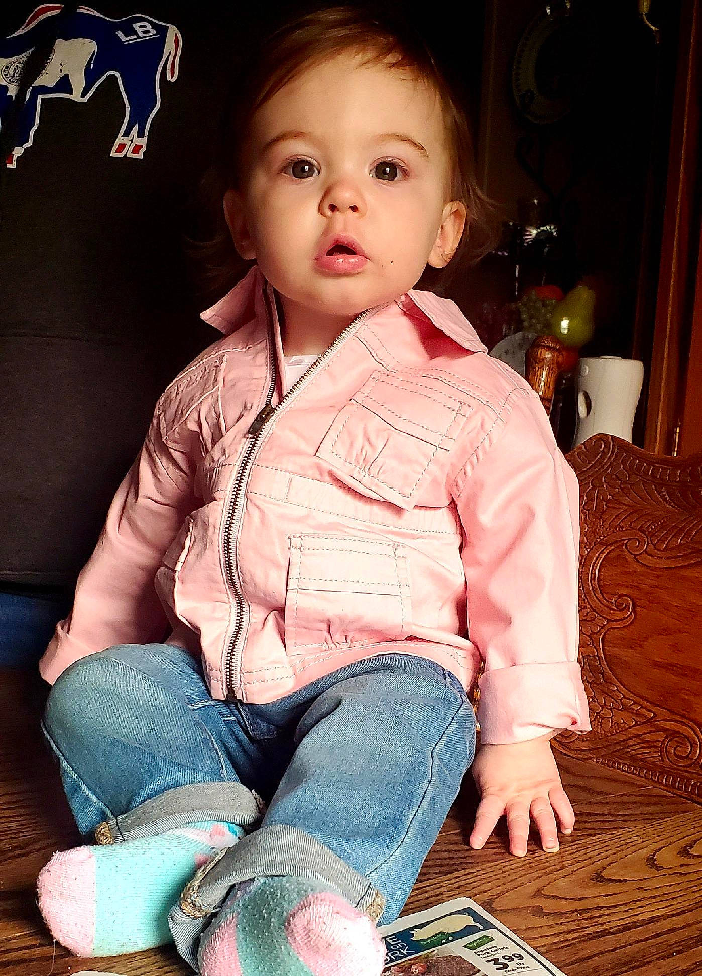 Rilynn joined the competition — help win amazing prizes! baby, cheek, child, child_model, eye, jeans, leg, person, sitting, skin, surprise, toddler