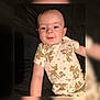Colby joined the competition — help win amazing prizes! arm, baby, child, clothing, cute, deer_print, eyes, fabric, face, happy, indoors, infant, lying_down, onesie, pattern, person, portrait, skin, smile, young