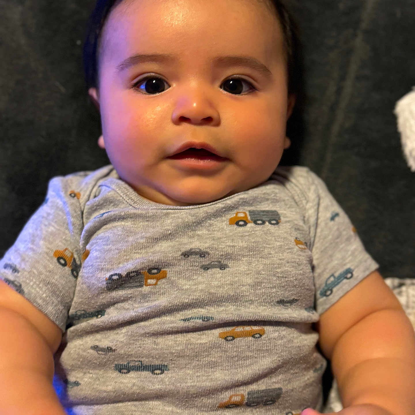 Nolan joined the competition — help win amazing prizes! applique, baby, bodypart, clothing, face, finger, hand, happy, head, longsleeve, mouth, newborn, pattern, person, photography, portrait, sitting, sleeve, smile, t_shirt