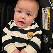 Jhosua joined the competition — help win amazing prizes! baby, black_and_white, blue_eyes, canopy, car_seat, child, chubby_hands, closeup, cute, human, indoors, infant, onesie, portrait, seat_buckle, skin, smile, striped_clothing, teddy_patch, warning_label